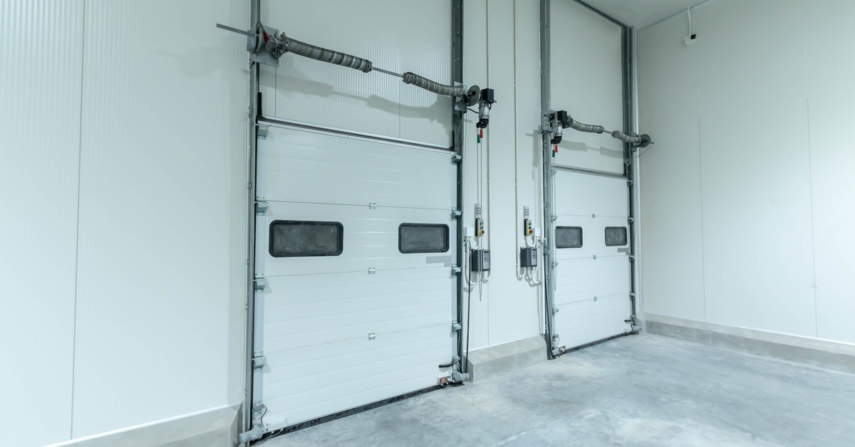 Two freezer doors that open by lifting upward. Each door has two small windows in the top panel.